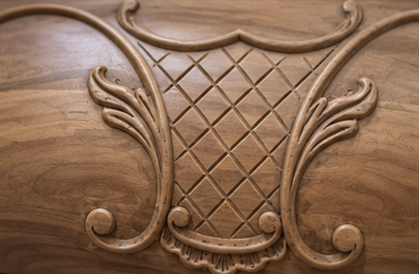 Gros plan sur les motifs sculptés et le décor central d'un meuble ancien